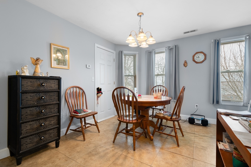 15 King Philip Road Worcester, MA 01606 - Photo 15 of 42 a view of a dining room with furniture