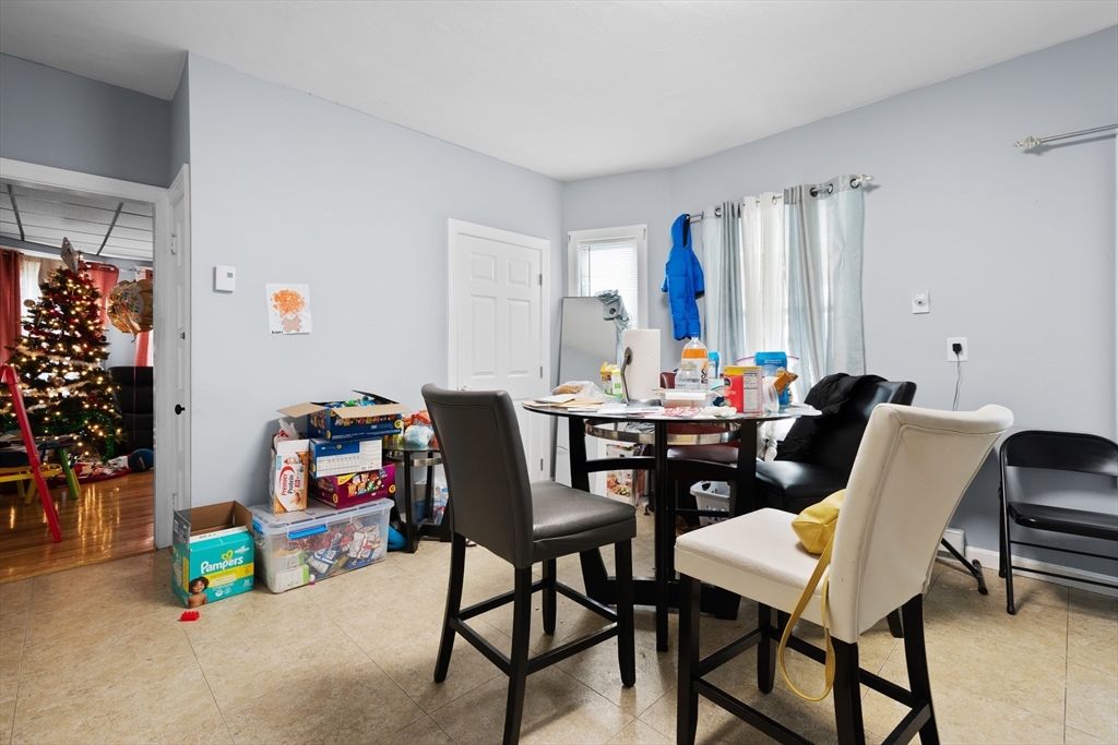15 King Philip Road Worcester, MA 01606 - Photo 34 of 42 a dining room with a table and chairs