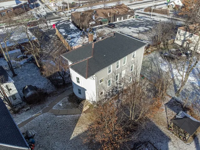 a aerial view of a house with garden