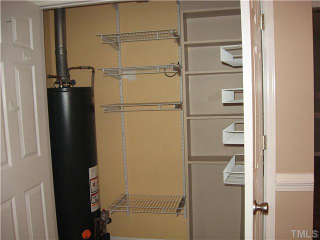 Big walk in pantry and new gas water heater. Gas is turned off to the house until inspection time.