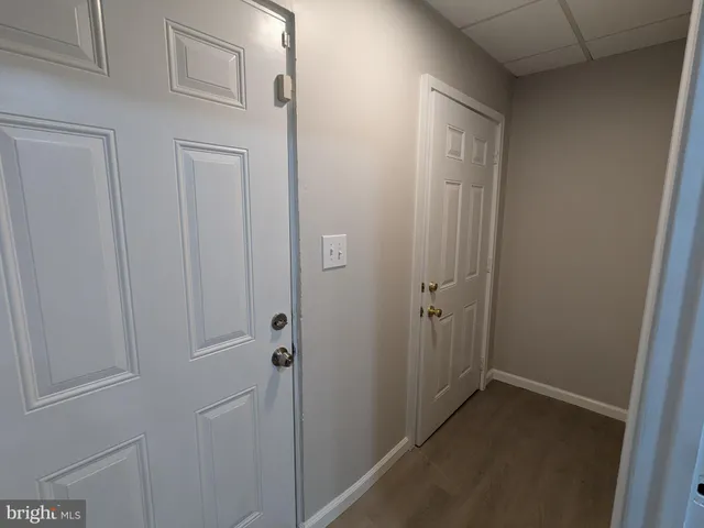 a view of a room with rack on the wall