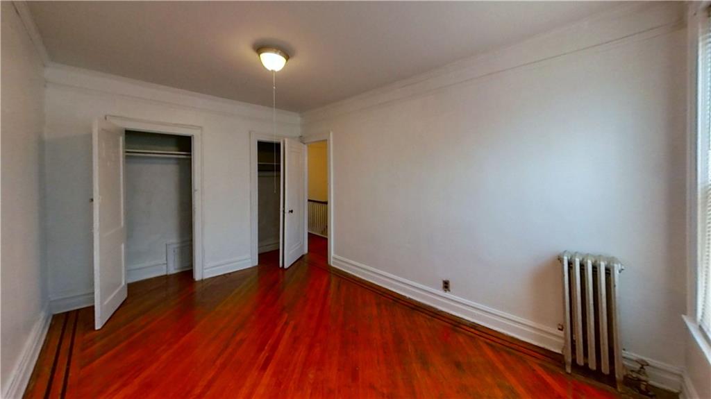 2552 East 19th Street Brooklyn, NY 11235 - Photo 14 of 34 a view of a room with wooden floor