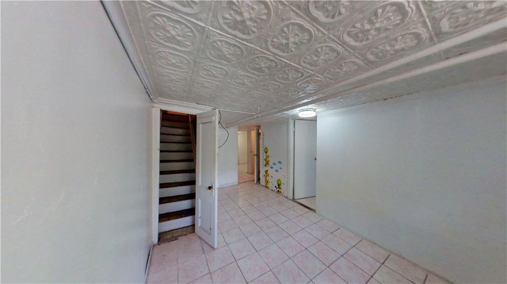 2552 East 19th Street Brooklyn, NY 11235 - Photo 21 of 34 wooden floor in an empty room