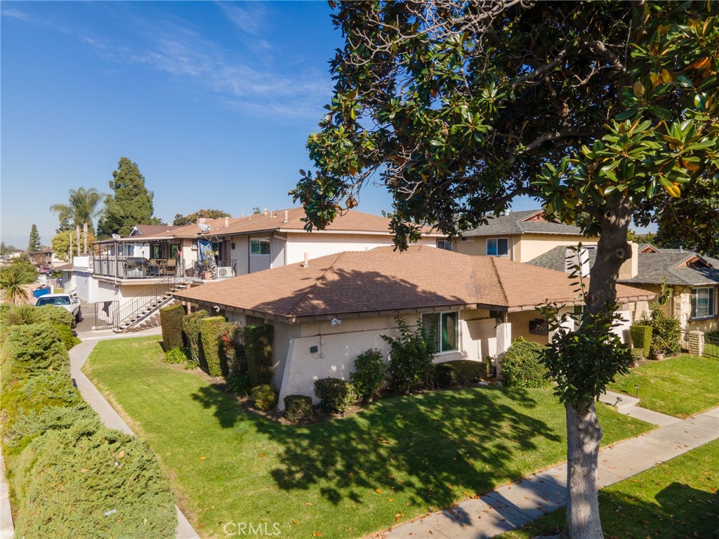 1215 South Athena Way Anaheim, CA 92806 - Photo 1 of 16 a view of a swimming pool with a patio