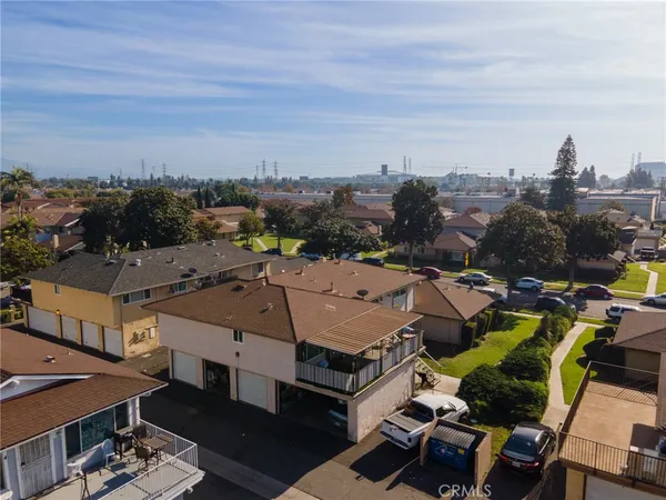 a kitchen with granite countertop a sink and a stove top oven