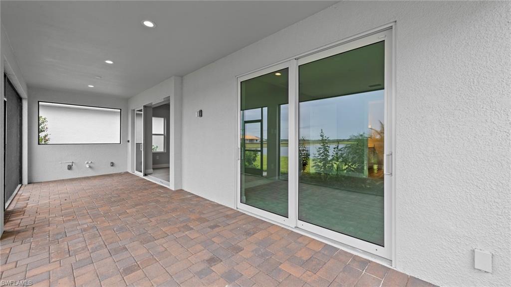 4568 Centaurus Circle Naples, FL 34120 - Photo 42 of 47 a view of a big room with closet and front door