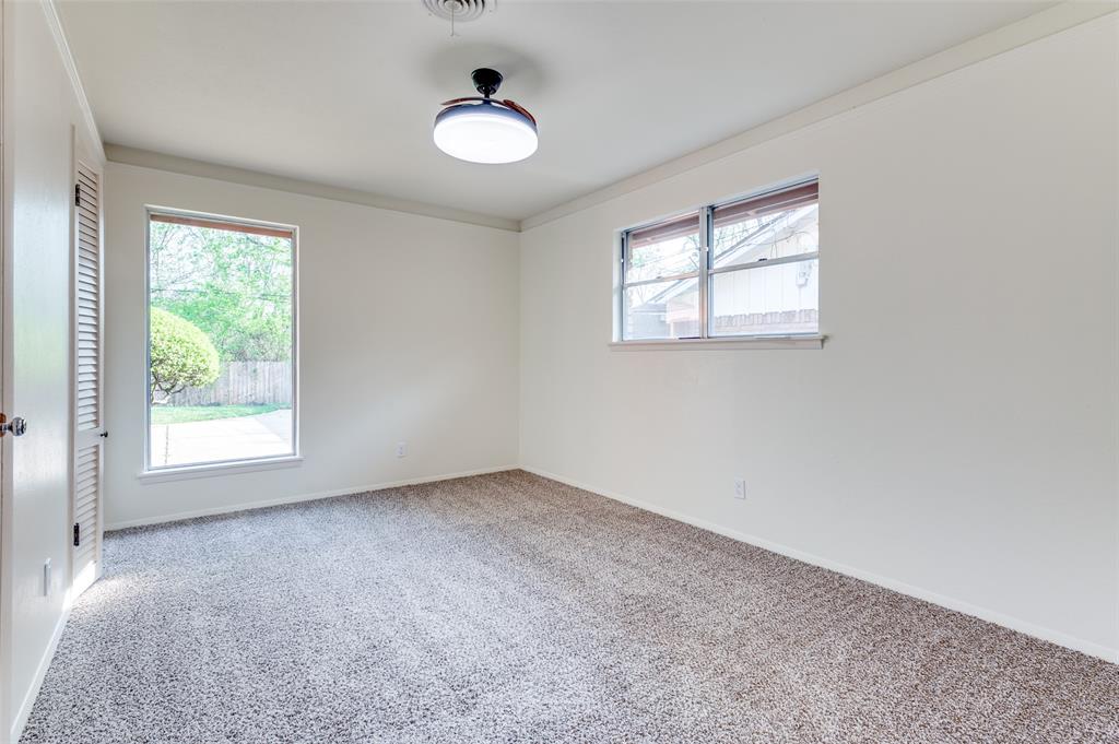 6809 Yolanda Drive Fort Worth, TX 76112 - Photo 20 of 22 an empty room with a window