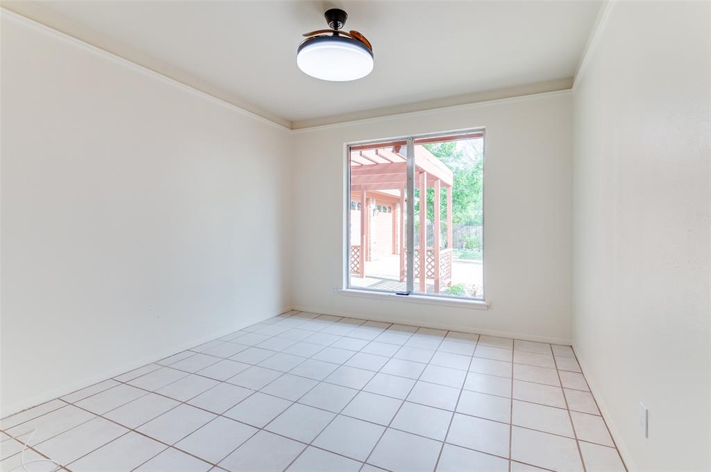 6809 Yolanda Drive Fort Worth, TX 76112 - Photo 22 of 22 an empty room with windows