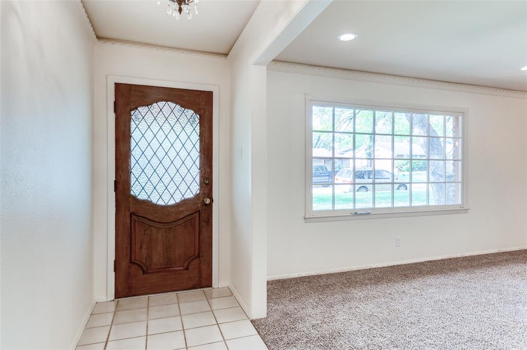 6809 Yolanda Drive Fort Worth, TX 76112 - Photo 4 of 22 an empty room with windows