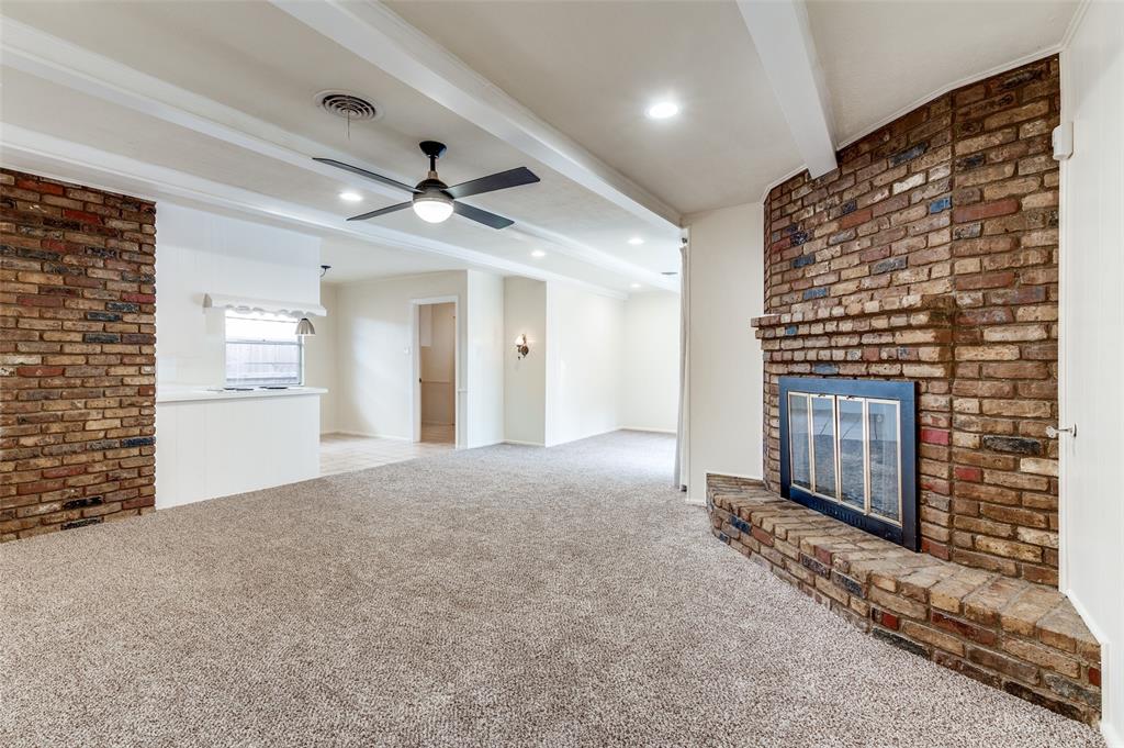6809 Yolanda Drive Fort Worth, TX 76112 - Photo 7 of 22 a view of a livingroom with a fireplace