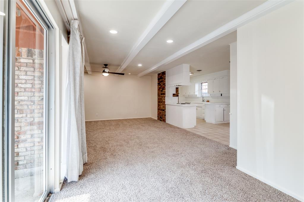 6809 Yolanda Drive Fort Worth, TX 76112 - Photo 10 of 22 a view of a kitchen with a sink and cabinets