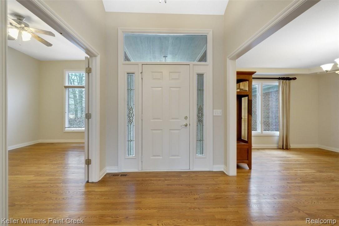 1400 Army Road Leonard, MI 48367 - Photo 14 of 56 Beautiful solid hardwood floors in entry, office, dining, hallways, kitchen and half bath on main level.