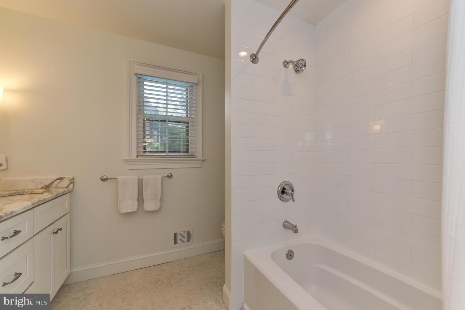 6616 Kenhill Road Bethesda, MD 20817 - Photo 23 of 30 Guest Bathroom w/ Shower/Tub