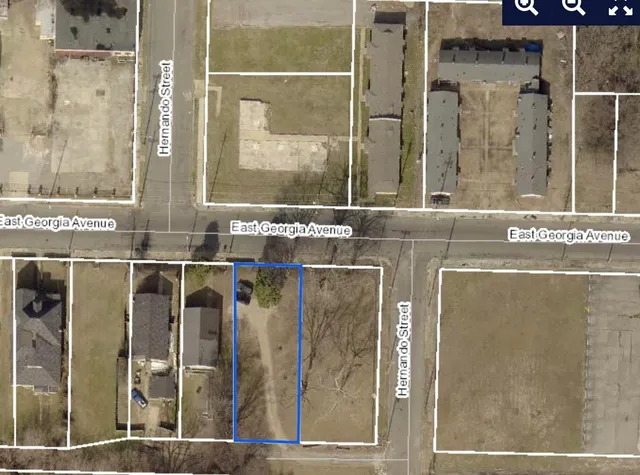 a view of a bathroom with shower