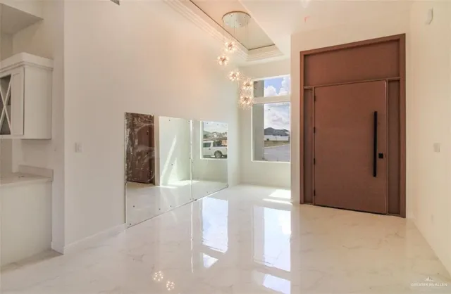 a bathroom with a glass door shower