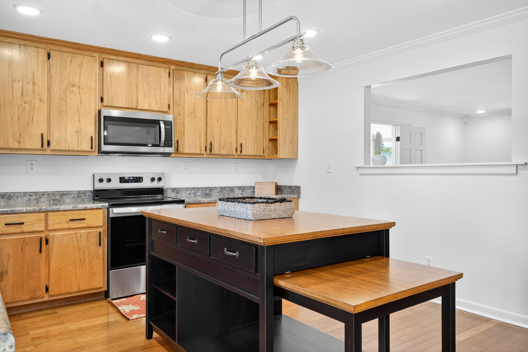 780 Champ Road Flintville, TN 37335 - Photo 15 of 45 a kitchen with a stove and a microwave