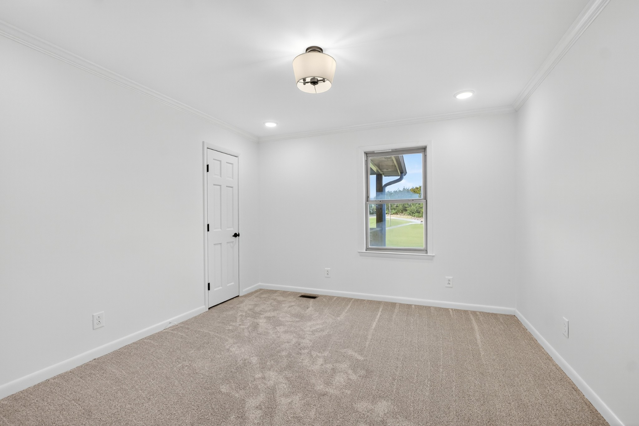 780 Champ Road Flintville, TN 37335 - Photo 27 of 45 wooden floor in an empty room with a window
