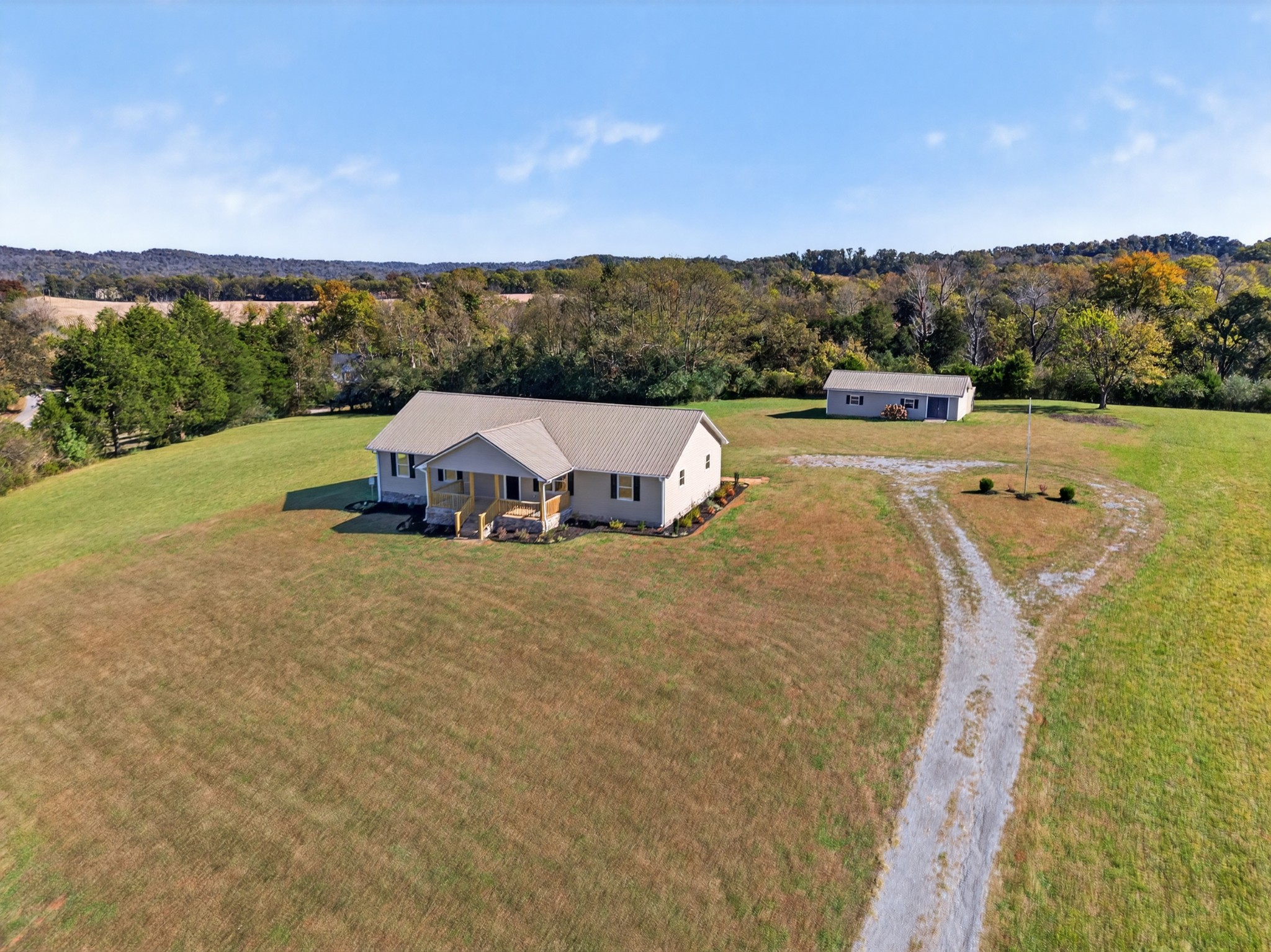 780 Champ Road Flintville, TN 37335 - Photo 3 of 45 a view of a swimming pool with mountains in the background