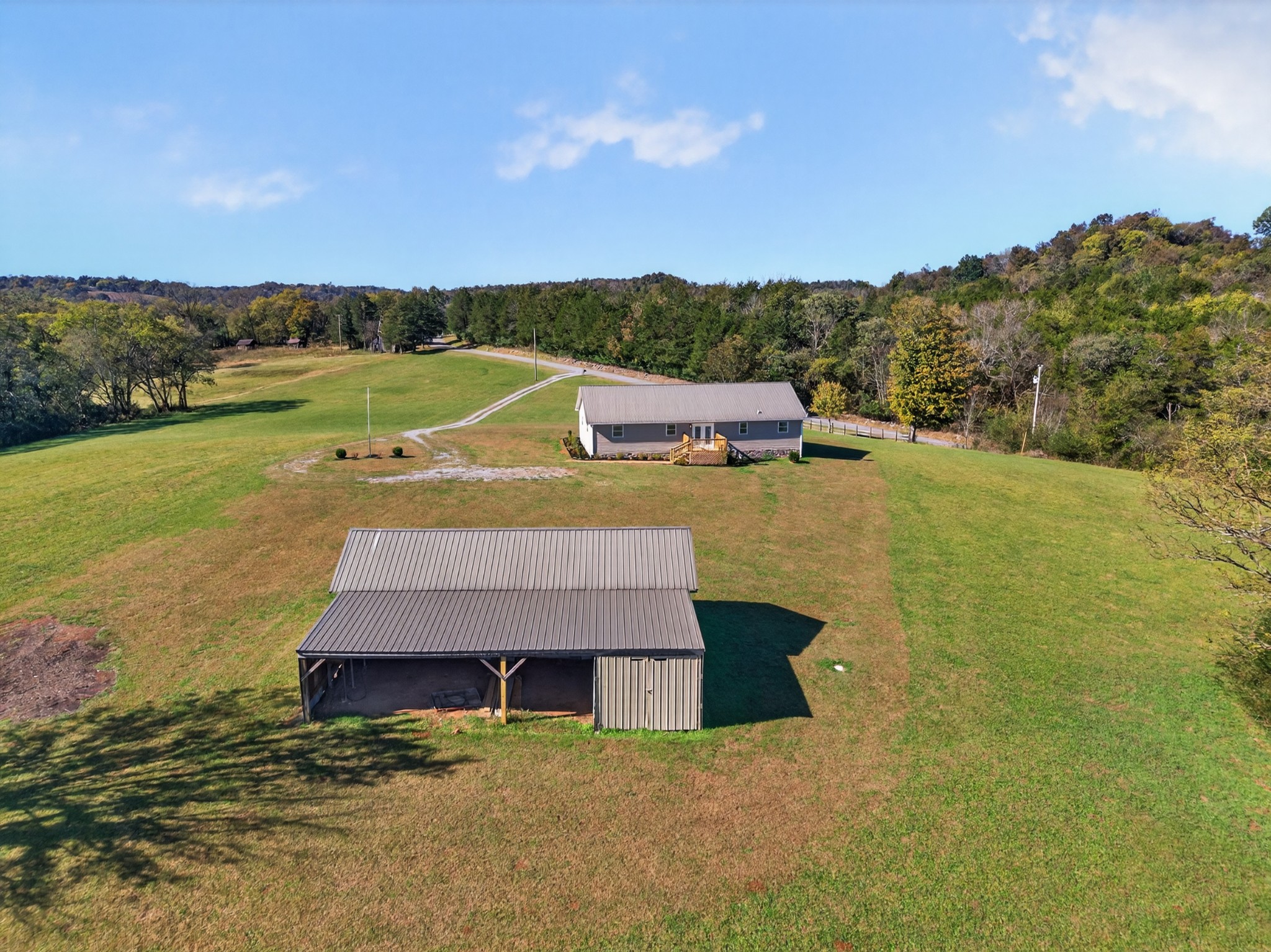780 Champ Road Flintville, TN 37335 - Photo 39 of 45 an aerial view of a house with a yard