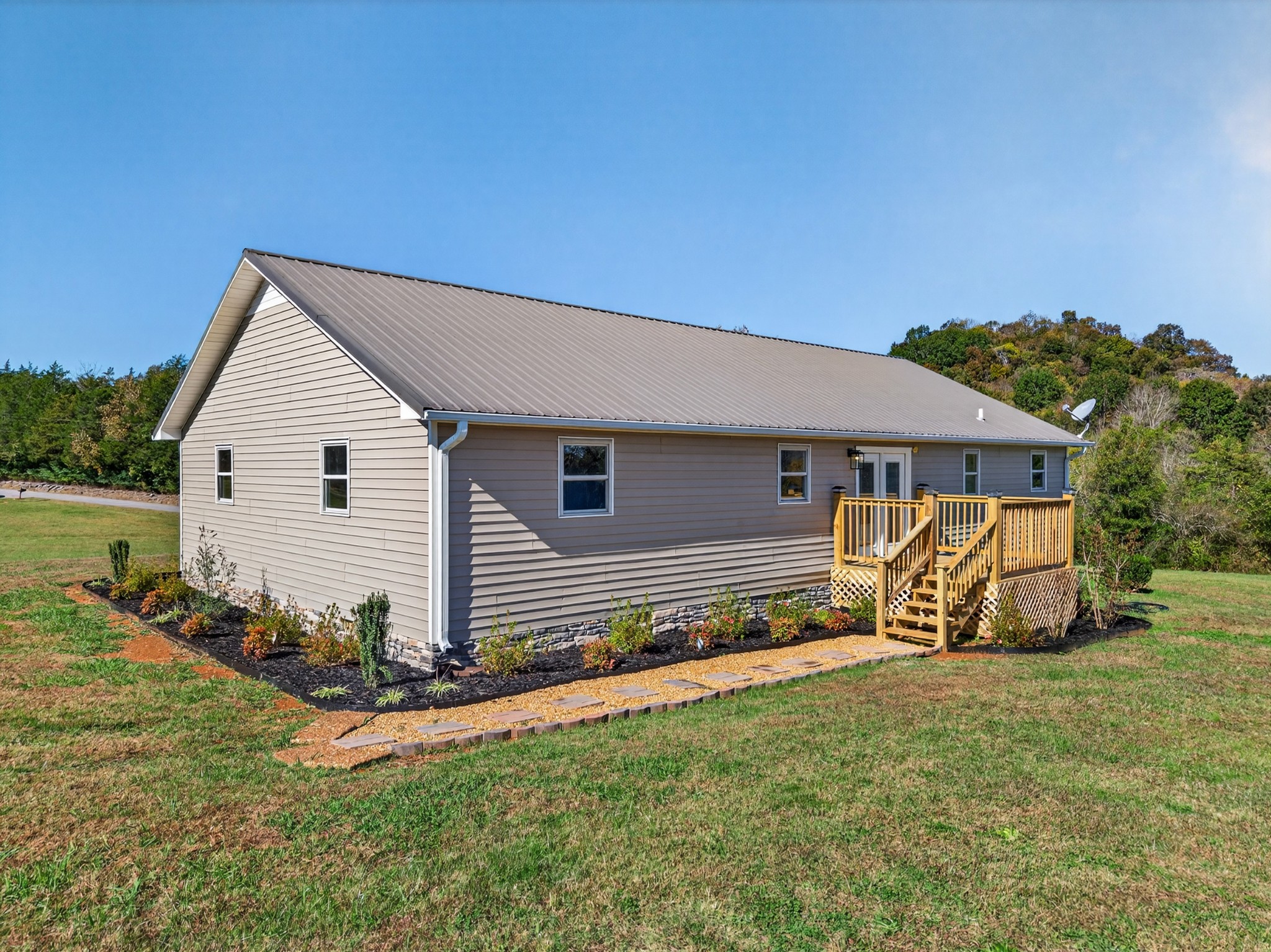 780 Champ Road Flintville, TN 37335 - Photo 40 of 45 a view of a house with backyard
