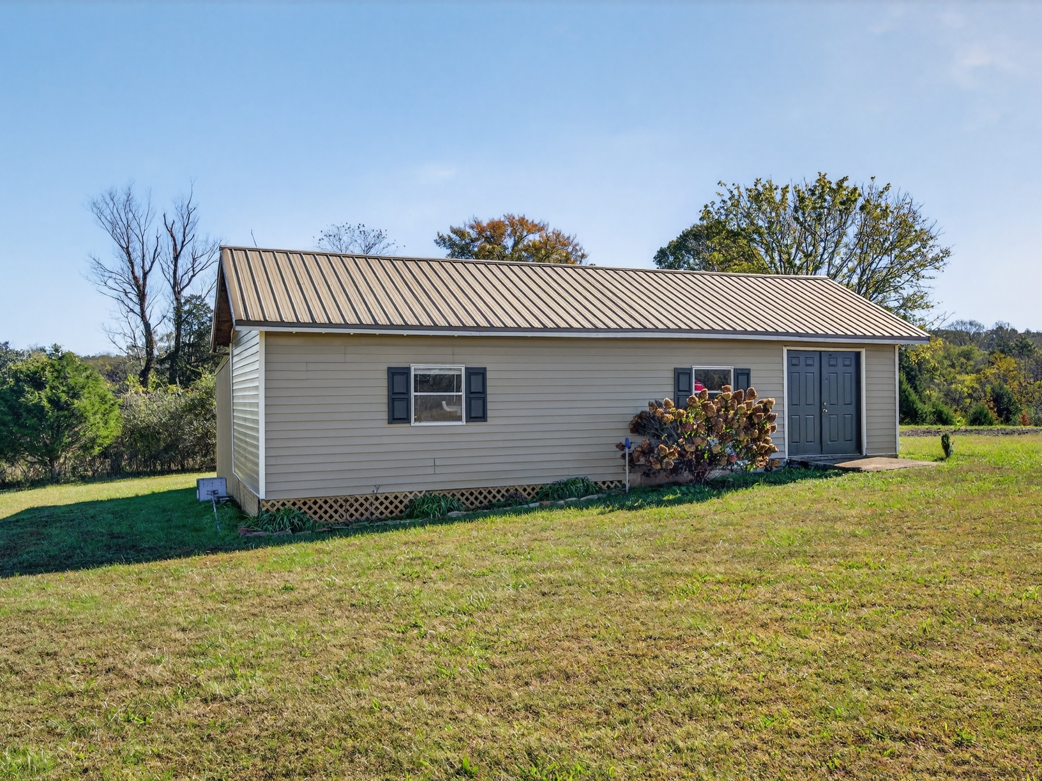 780 Champ Road Flintville, TN 37335 - Photo 44 of 45 a view of a house with a yard