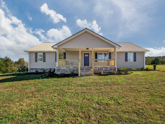 a view of a house with garden