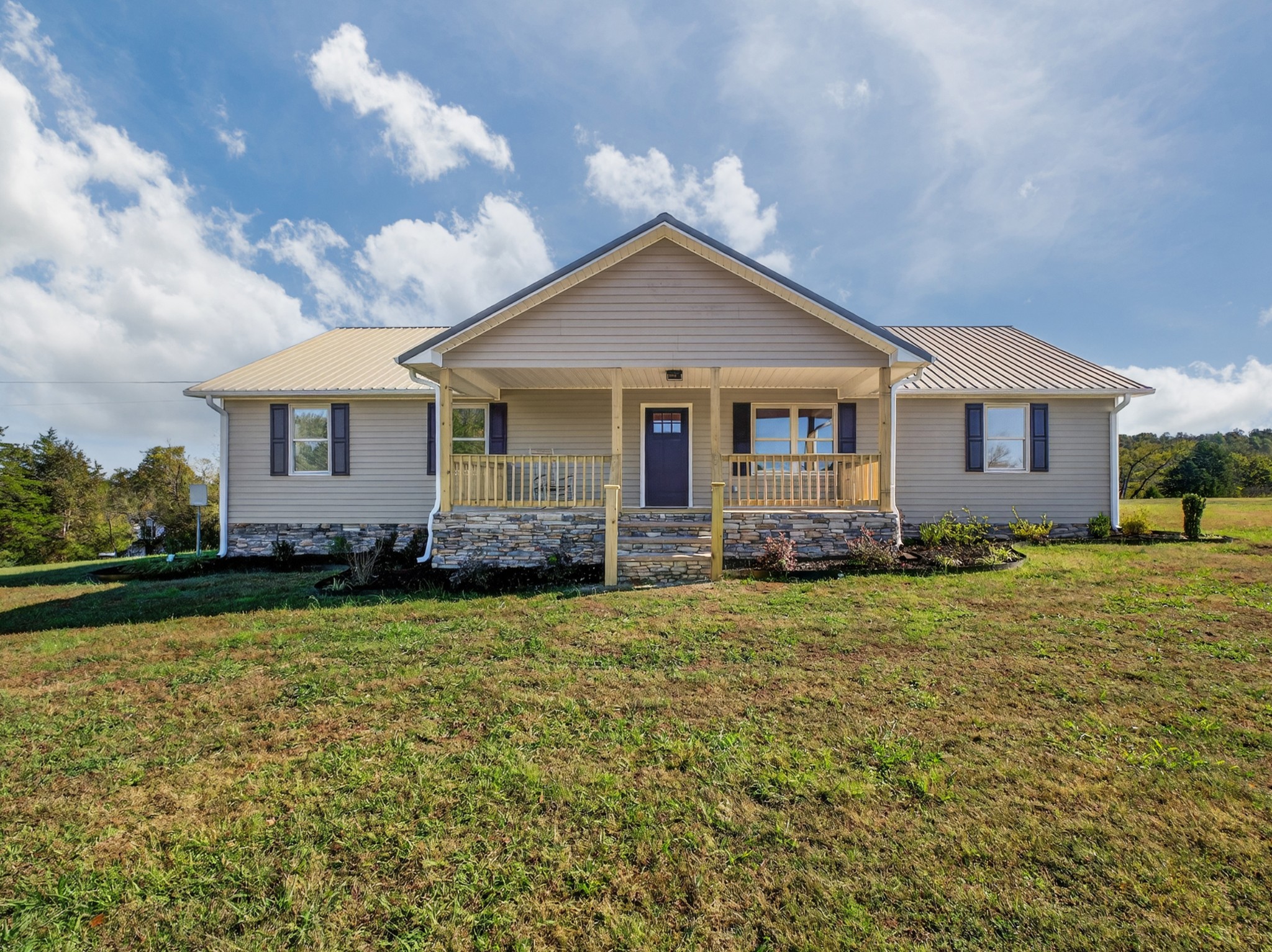 780 Champ Road Flintville, TN 37335 - Photo 5 of 45 a view of a house with garden