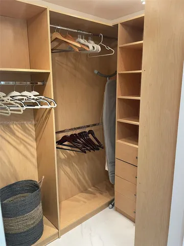 a bathroom with a sink double vanity and a mirror