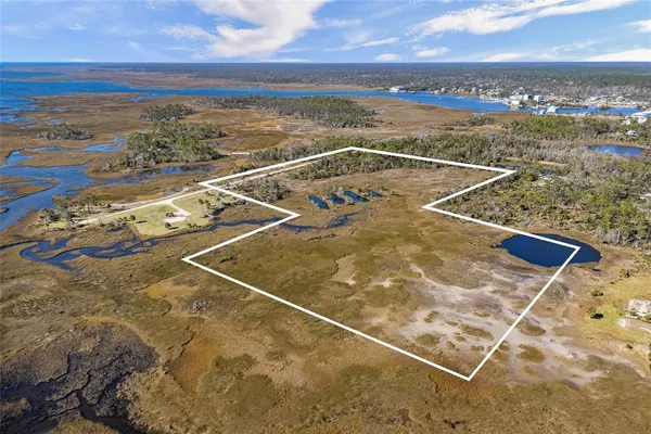 a view of a balcony with ocean view