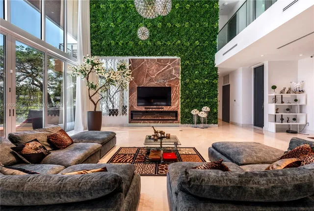 a outdoor living space with furniture and fireplace