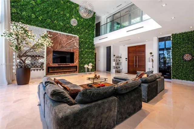 a kitchen with stainless steel appliances granite countertop a sink and a stove