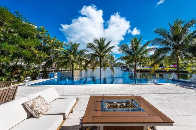 a view of a swimming pool with a chair
