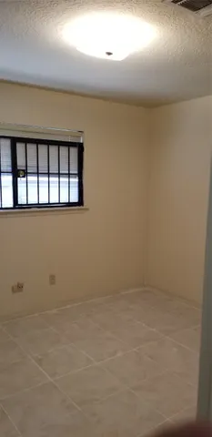 a view of a livingroom with wooden floor