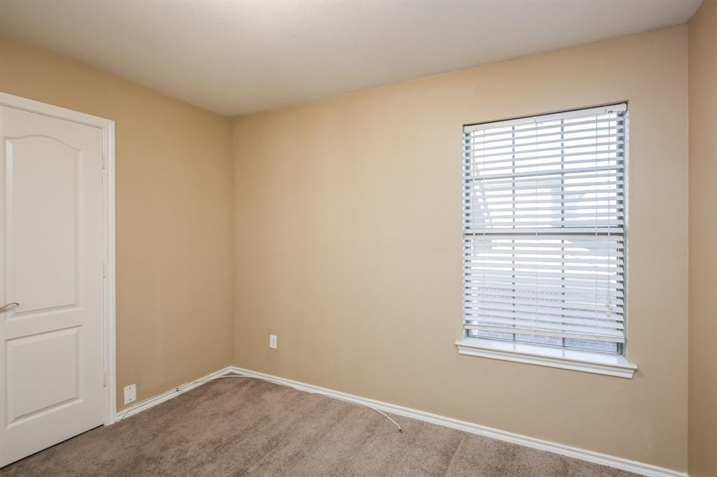 148 Cliff Height Circle Dallas, TX 75241 - Photo 5 of 17 a view of an empty room with a window