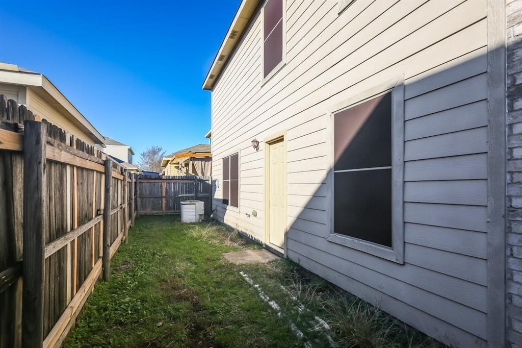 148 Cliff Height Circle Dallas, TX 75241 - Photo 7 of 17 a view of a house with a yard