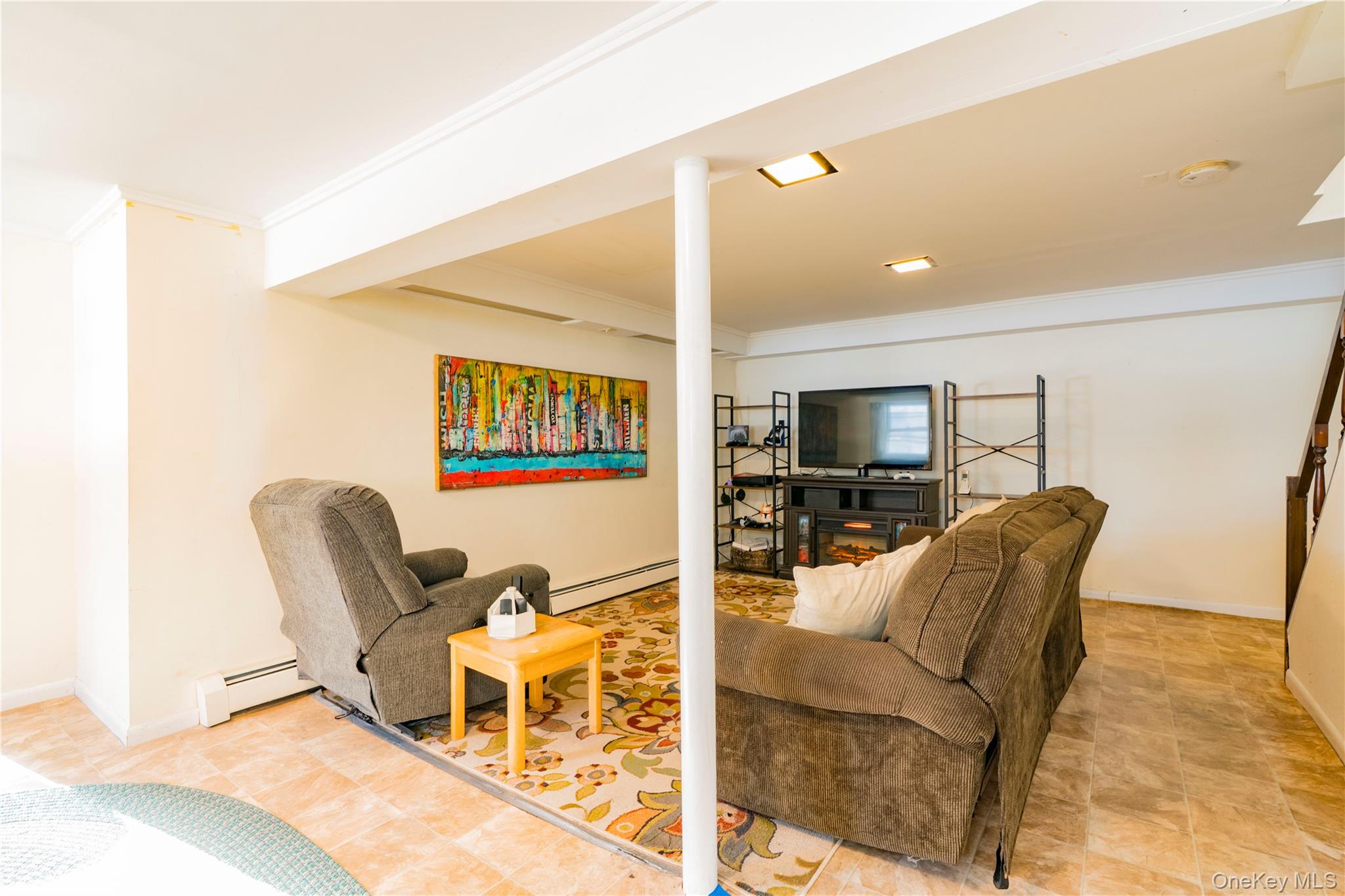 16 Saddle Ridge Drive Hopewell Junction, NY 12533 - Photo 17 of 19 Finished Family Room in the Basement with door to the backyard
