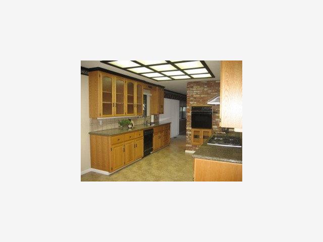760 Gary Street Gilroy, CA 95020 - Photo 4 of 9 a kitchen with a sink and a stove top oven