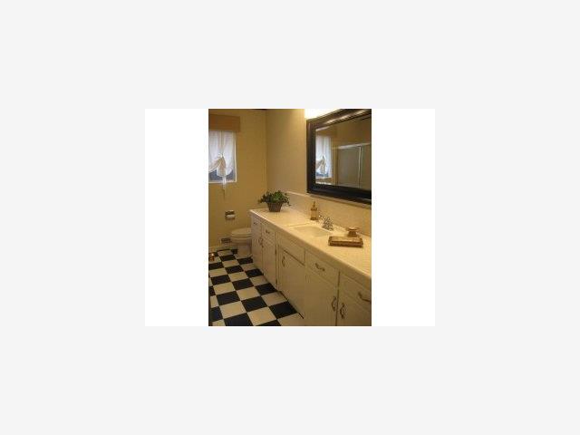 760 Gary Street Gilroy, CA 95020 - Photo 5 of 9 a bathroom with a sink and a mirror