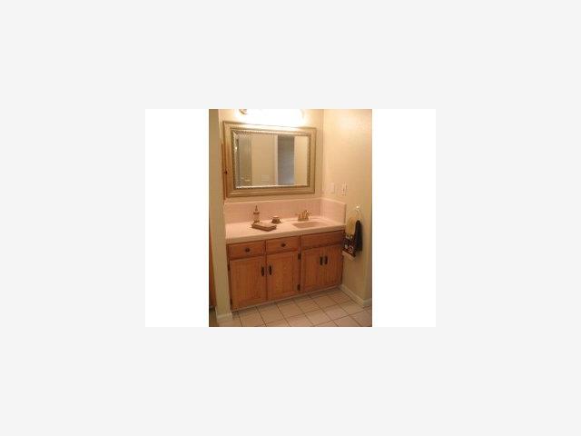 760 Gary Street Gilroy, CA 95020 - Photo 6 of 9 a bathroom with a sink and a mirror