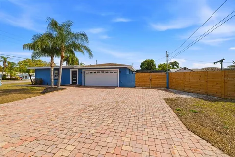 a view of a backyard of a house