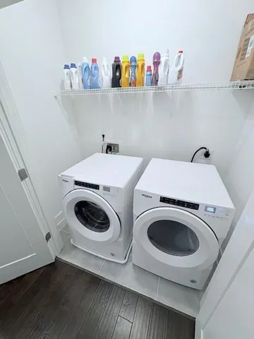 a utility room with dryer and washer