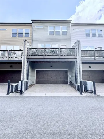 a view of an empty room with a fireplace