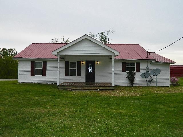 638 Pernell Road White Bluff, TN 37187 - Photo 1 of 17 Front view of home on nice level 1 acre lot.