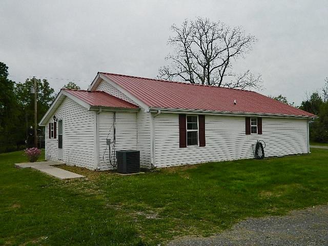 638 Pernell Road White Bluff, TN 37187 - Photo 2 of 17 Back view of house. Metal roof is new.