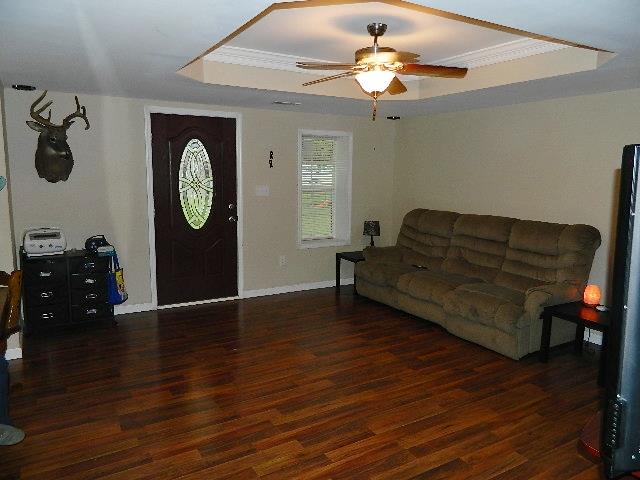 638 Pernell Road White Bluff, TN 37187 - Photo 7 of 17 Living room has new tray ceiling, new laminate flooring and house has new paint throughout.