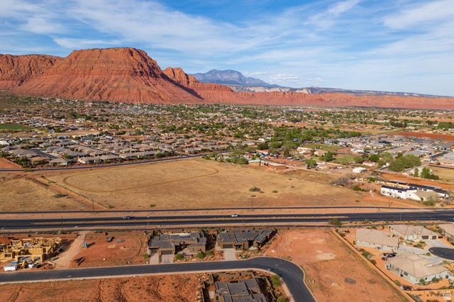 545 Wild Indigo Way, Unit 60 Ivins, UT 84738 - Photo 13 of 15 View of mountain backdrop featuring nearby suburban area