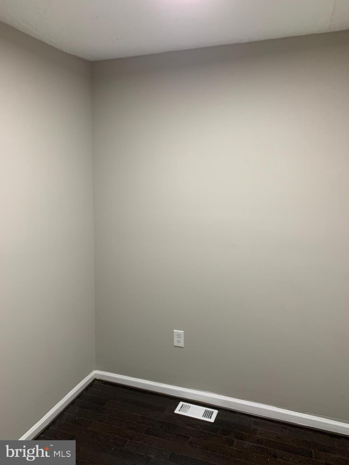 2708 Mathews Street Baltimore, MD 21218 - Photo 12 of 19 a view of a small space with wooden floor