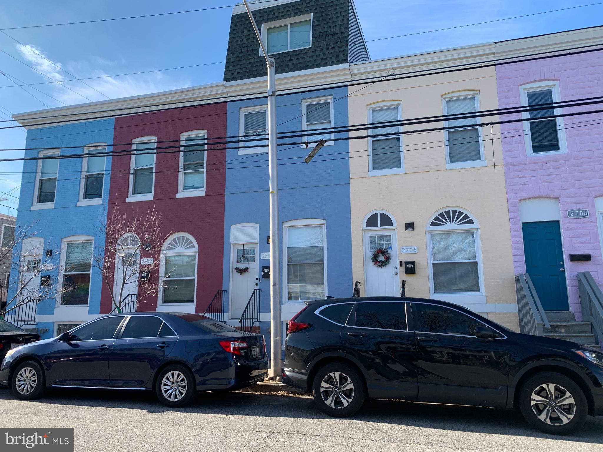 2708 Mathews Street Baltimore, MD 21218 - Photo 2 of 19 a view of a car parked in front of a building