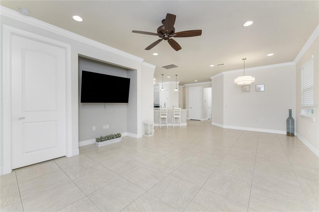 13869 Alafaya Street Venice, FL 34293 - Photo 21 of 75 a view of a livingroom with a flat screen tv