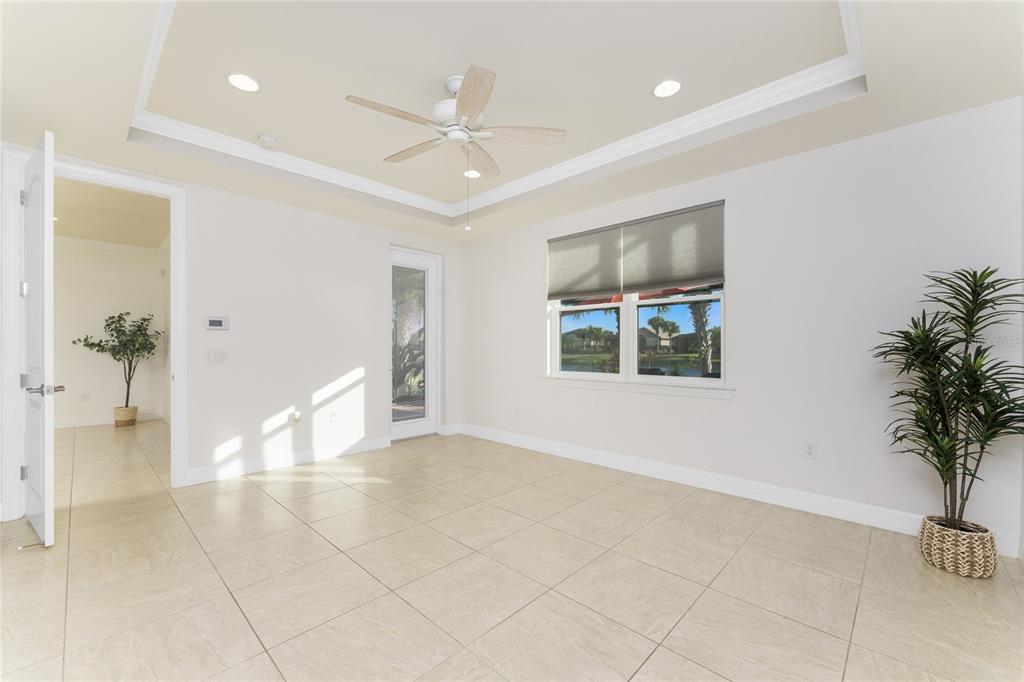 13869 Alafaya Street Venice, FL 34293 - Photo 27 of 75 a view of an empty room and window